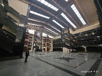 Spacious sabha hall atrium at Shri Shiv Krishna Dham pilgrim complex, Vrindavan