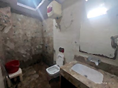 Standard attached bathroom at Shri Shiv Krishna Dham guesthouse, Vrindavan