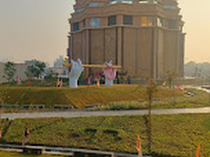 Landscaped lawn with temple dome view near Shri Shiv Krishna Dham, Vrindavan