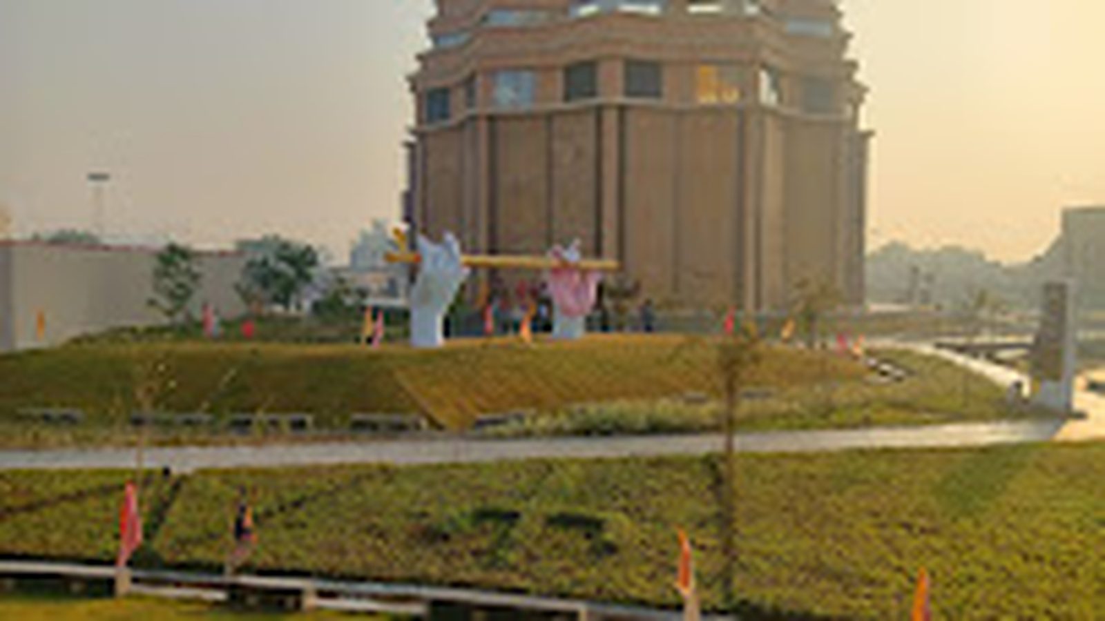Landscaped lawn with temple dome view near Shri Shiv Krishna Dham, Vrindavan